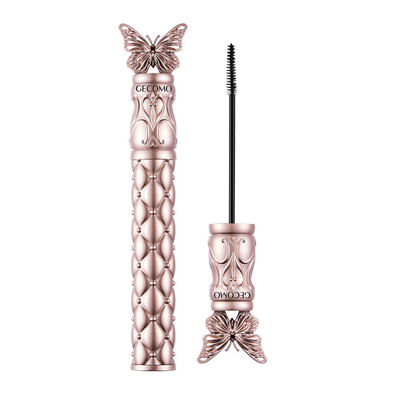 CECOMO Fluttering Butterflies Volumizing Mascara: Lengthens and curls lashes, smudge-proof, sweat-resistant, and long-lasting. Features a fine comb to coat and set lashes.