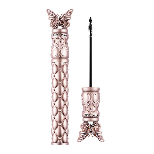 CECOMO Fluttering Butterflies Volumizing Mascara: Lengthens and curls lashes, smudge-proof, sweat-resistant, and long-lasting. Features a fine comb to coat and set lashes.