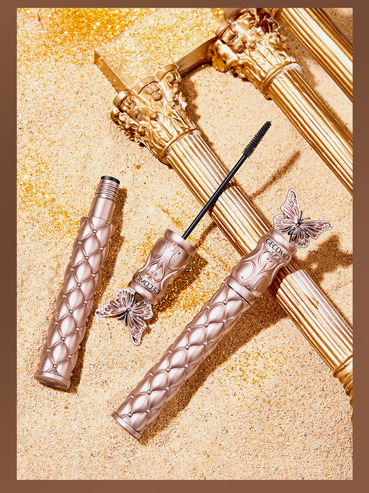 CECOMO Fluttering Butterflies Volumizing Mascara: Lengthens and curls lashes, smudge-proof, sweat-resistant, and long-lasting. Features a fine comb to coat and set lashes.